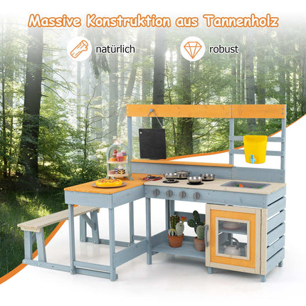 Barnens utomhuslekkök med picknickbord och diskho